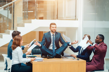 man meditating with smile, dealing with emotional angry customer