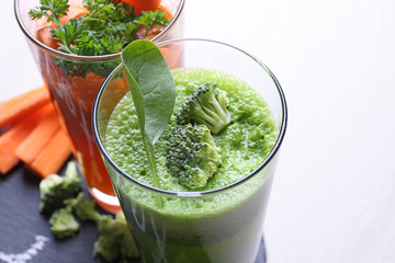 Fresh vegetable juices in glasses, closeup