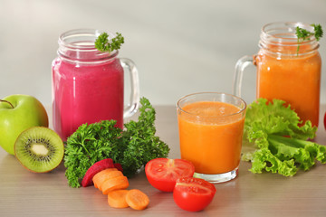 Fresh juices and ingredients on table