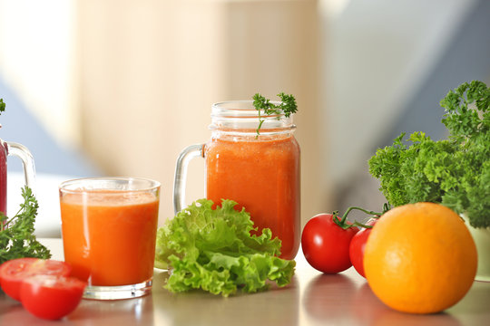 Fresh juices and ingredients on table