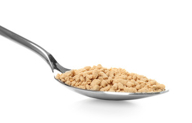 Spoon with superfood powder on white background