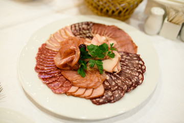 Sausage, sliced at the table.