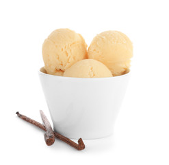 Bowl with delicious vanilla ice-cream balls on white background