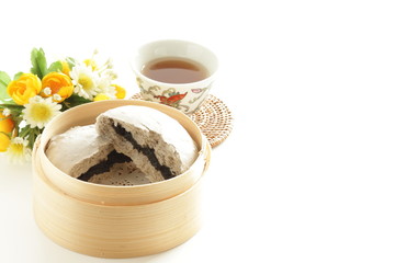 black sesame chinese bun and tea