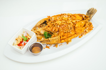 Fried sea bass meat fish with sauce