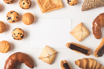 various types of pastry and blank card