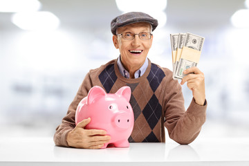 Senior with a piggybank and bundles of money