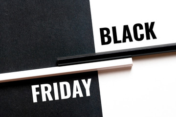 black friday, monochrome concept with paper sheets and pencils