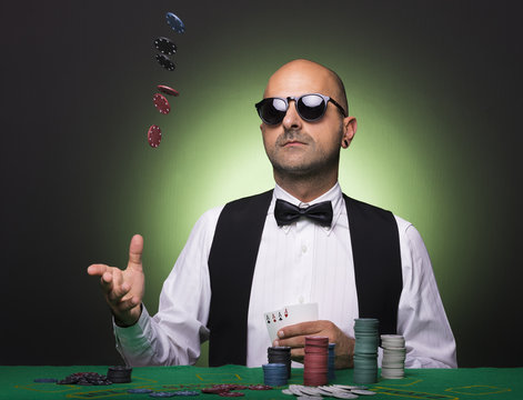 Player throwing poker chips at the table