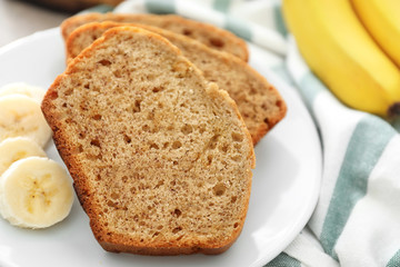 Sliced banana bread on plate