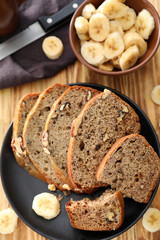 Sliced banana bread with nuts on plate
