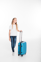 female child with luggage