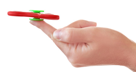 Man holding modern spinner on white background