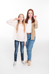 Fototapeta premium mother and daughter brushing teeth