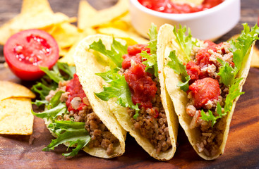 mexican tacos with meat and nachos