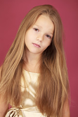Naklejka premium Beautiful blonde little girl