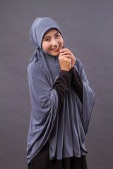 excited happy smiling smart casual muslim asian woman posing cheerful, successful pose