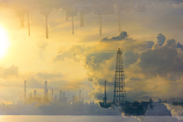 Double Exposure image of Oil Refinery Industry Plant in Bangkok, Thailand in orange and gray mood and tone. Conventional energy concept.