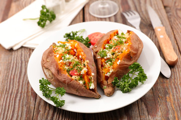 baked sweet potato with cheese and herbs