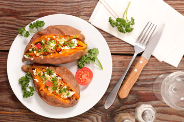 baked sweet potato with cheese and herbs