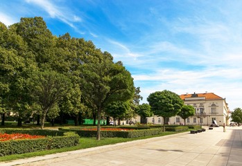 Fototapeta premium Warsaw, Poland - August 2, 2017: Architecture and people on the street New World in Warsaw.