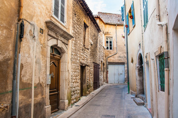 Fototapeta na wymiar View of a little narrow street in the town of Brignoles in Provence, south of France