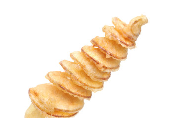 Closeup of a stick of spiral fried potato