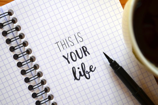 THIS IS YOUR LIFE hand lettered in notebook