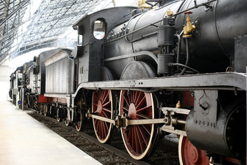 Fototapeta na wymiar Old locomotive standing at railway station
