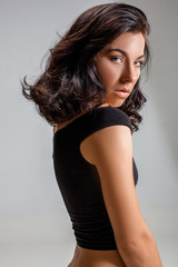 Fototapeta premium Beauty portrait of young adorable fresh looking brunette woman with brown healthy hair.