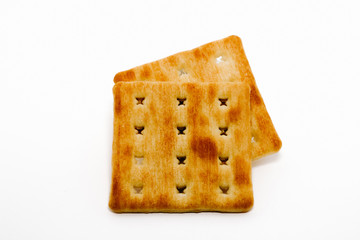cream cracker biscuits over the white background