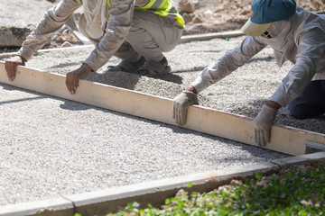 workers dub road sand and gravel