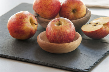 Ripe unpeeled juicy red yellow apples fall 