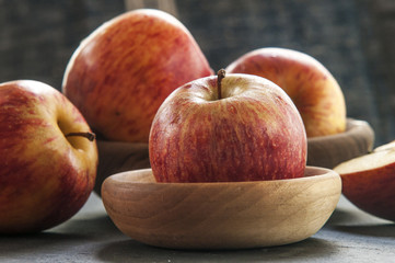 Ripe unpeeled juicy red yellow apples fall 