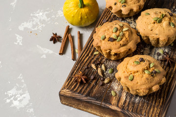 Autumn pumpkin muffins with spices, chocolate drops and pumpkin