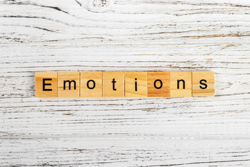 EMOTIONS word made with wooden blocks concept