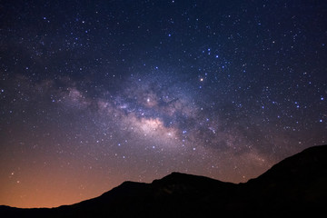 Beautiful milky way galaxy over moutain on a night sky before sunrise.