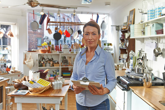 Portrait Of Businesswoman Srtanding In Cook Shop