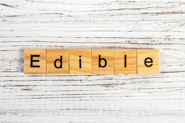 EDIBLE word made with wooden blocks concept