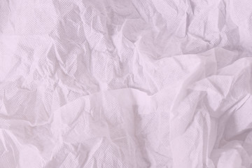 Obraz premium Wrinkled sheet paper white and pink , empty space for text background.