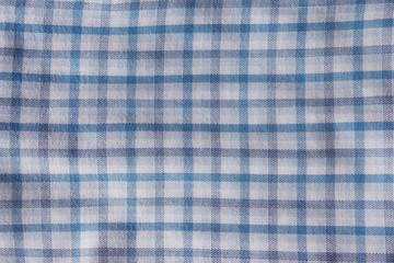 Cotton fabric natural ,Grid pattern blue and white and Rough surface background.