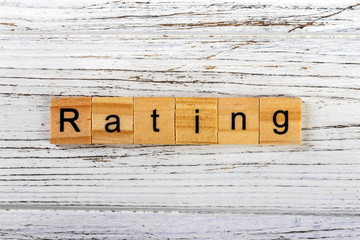 RATING word made with wooden blocks concept