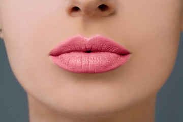 Pink Lips Makeup. Rose Lipstick and Clear Skin Closeup