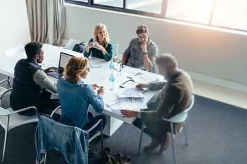 Business people discussing in meeting at office
