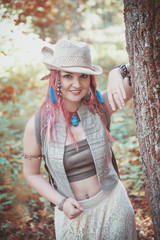 Portrait of beautiful woman boho style with red hair