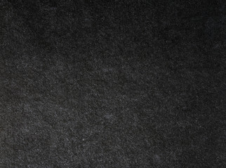 close up the black paper texture background