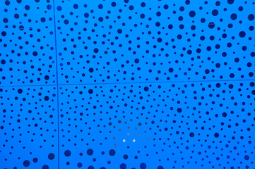 Dot wall and blue light background.
