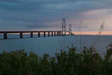 Fototapeta na wymiar Storebæltsbroen bridge during sunset