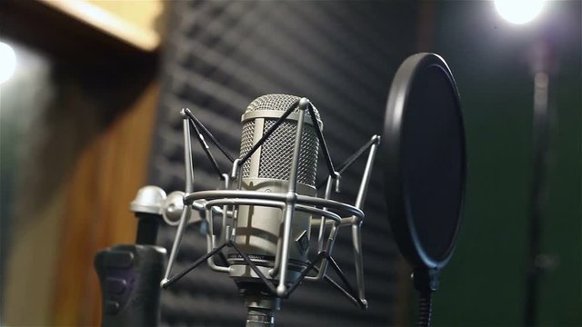 Studio recording, professional microphone in the recording studio, close up