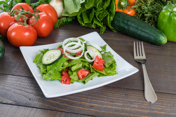 Fresh Salad on Wood Table